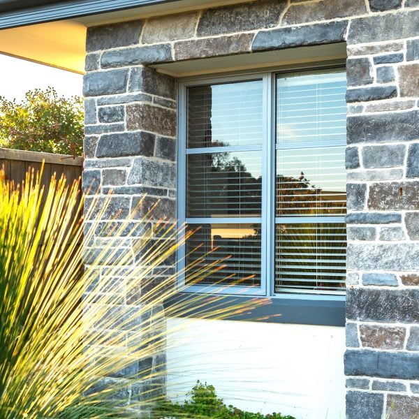 Romano Carved Stone in linear Bluestone transformed house